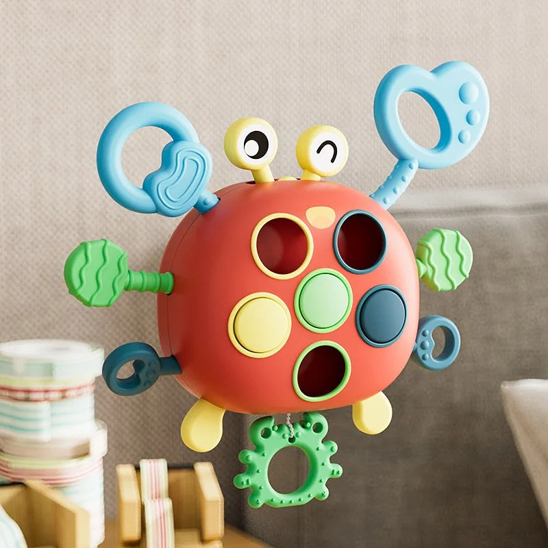 CleverCrawl – Silicone crab toy with looped pull strings and molded pressure points 1