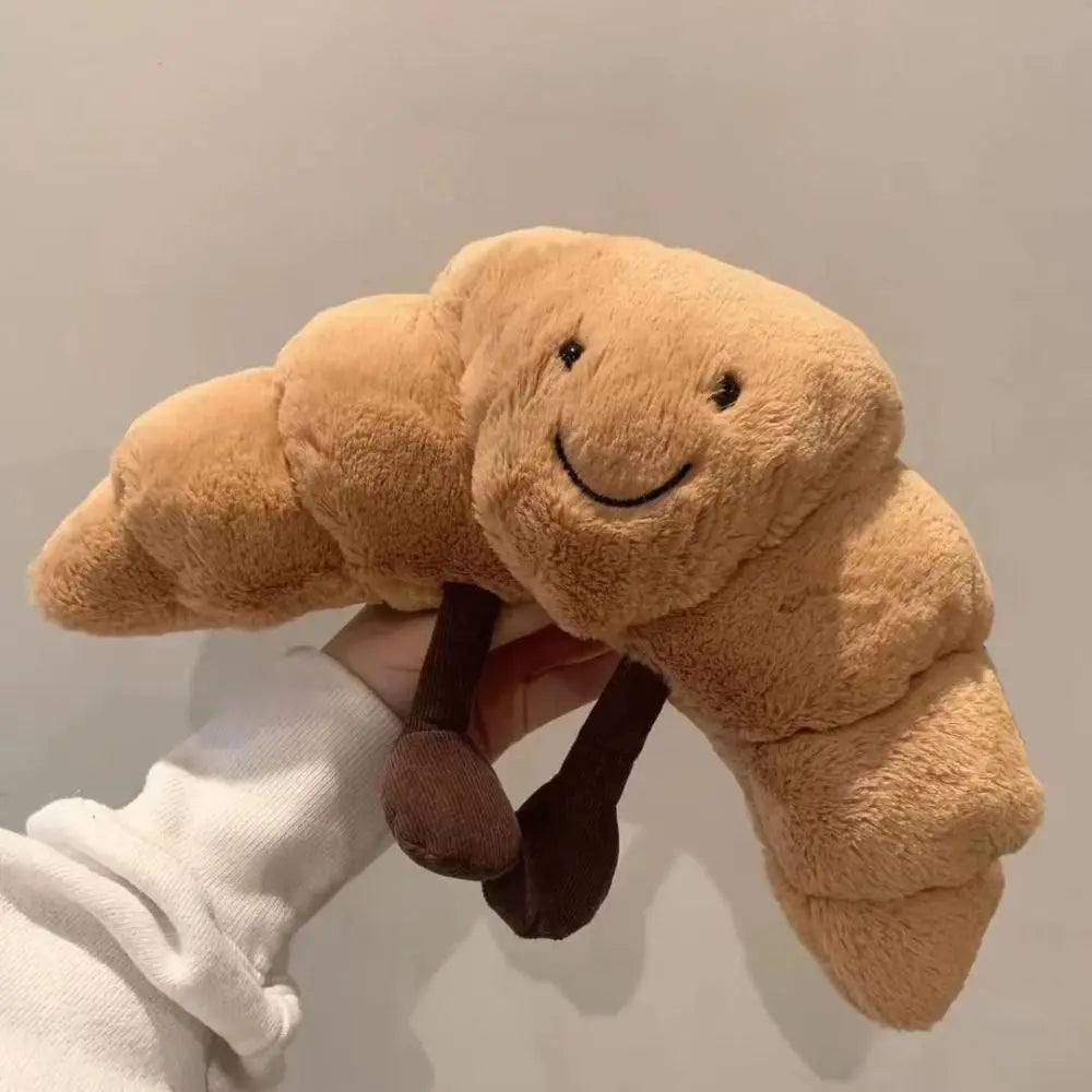 Knuffel Kussen Croissant Zacht Pluche 33 cm Lichtbruin met Lachend Gezichtje 2